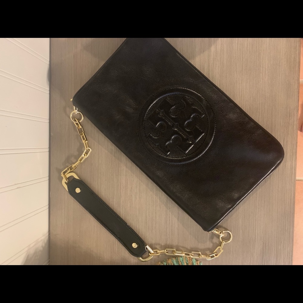 Tory Burch black  leather clutch  with gold strap